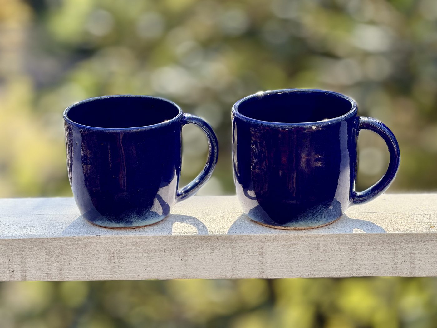 Stoneware Pair of “Blue whisper bottoms” mugs, handmade by Suzanne Luna