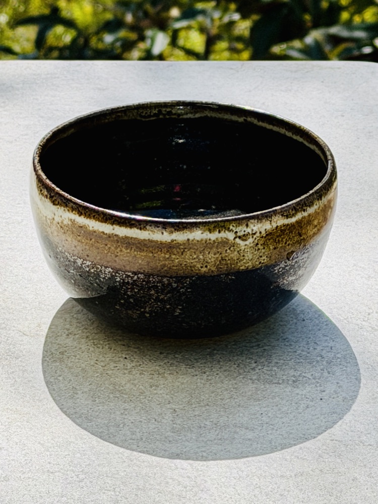 Brown bowl light rim, handmade by Suzanne Luna