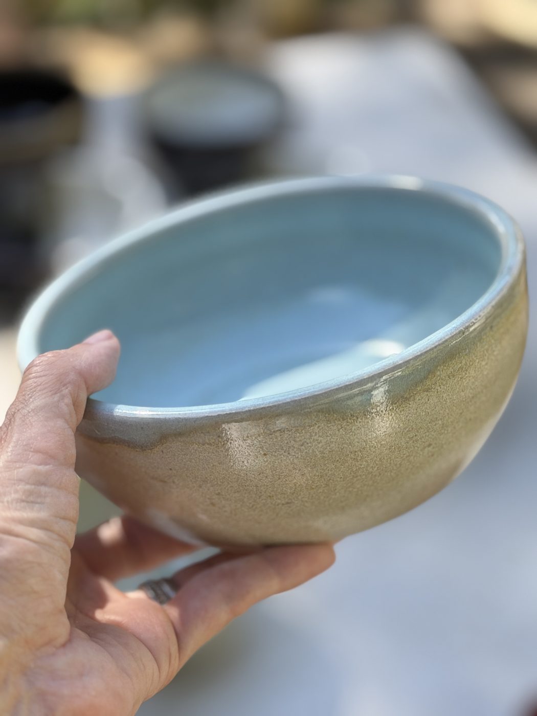 Stoneware medium interior blue, exterior grey bowl, handmade by Suzanne Luna